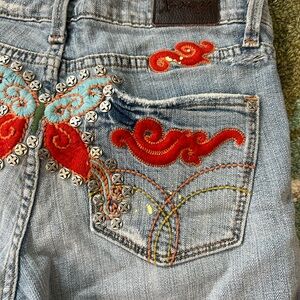 Embroidered Light Wash Women’s Jeans with Red Accent